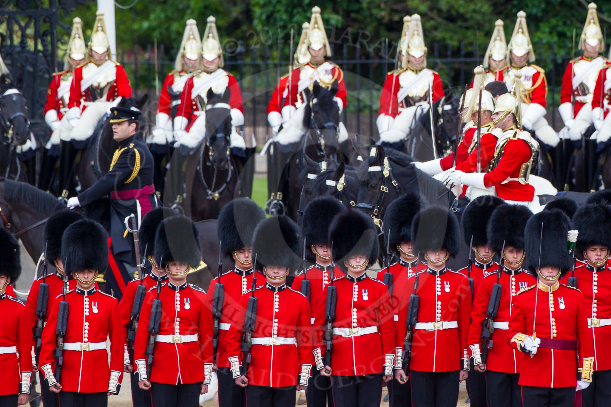 Major General's Review 2013: The Brigade Major Household Division Lieutenant Colonel Simon Soskin, Grenadier Guards, followed by the four Troopers of The Life Guard, during the Inspection of the Line..
Horse Guards Parade, Westminster,
London SW1,

United Kingdom,
on 01 June 2013 at 11:04, image #300