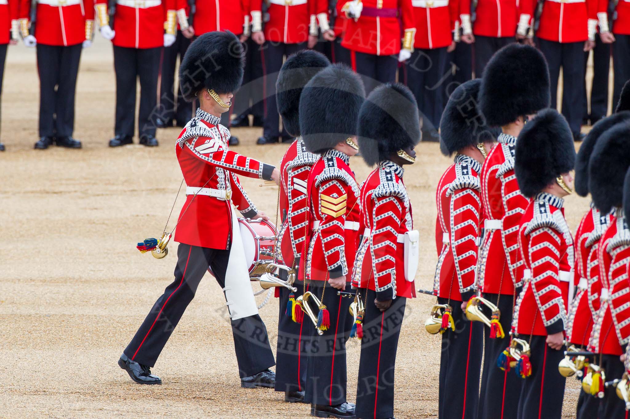 Major General's Review 2013: The "Lone Drummer", Lance Corporal Christopher Rees,  marches forward to re-join the band..
Horse Guards Parade, Westminster,
London SW1,

United Kingdom,
on 01 June 2013 at 11:14, image #365