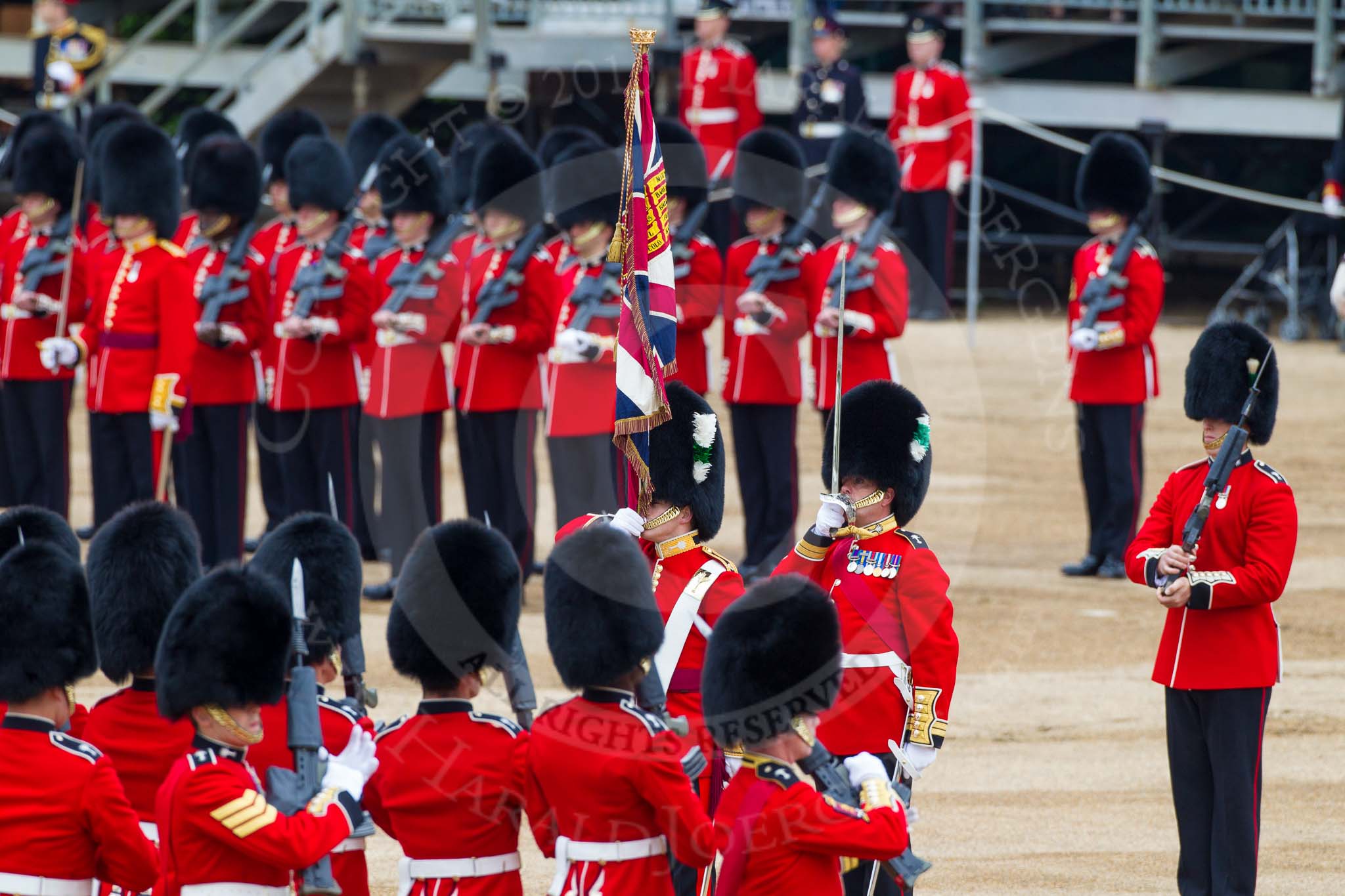Major General's Review 2013: The Ensign, Second Lieutenant Joel Dinwiddle, in posession of the Colour, turns around to No. 1 Guard, now the Escort to the Colour..
Horse Guards Parade, Westminster,
London SW1,

United Kingdom,
on 01 June 2013 at 11:19, image #405