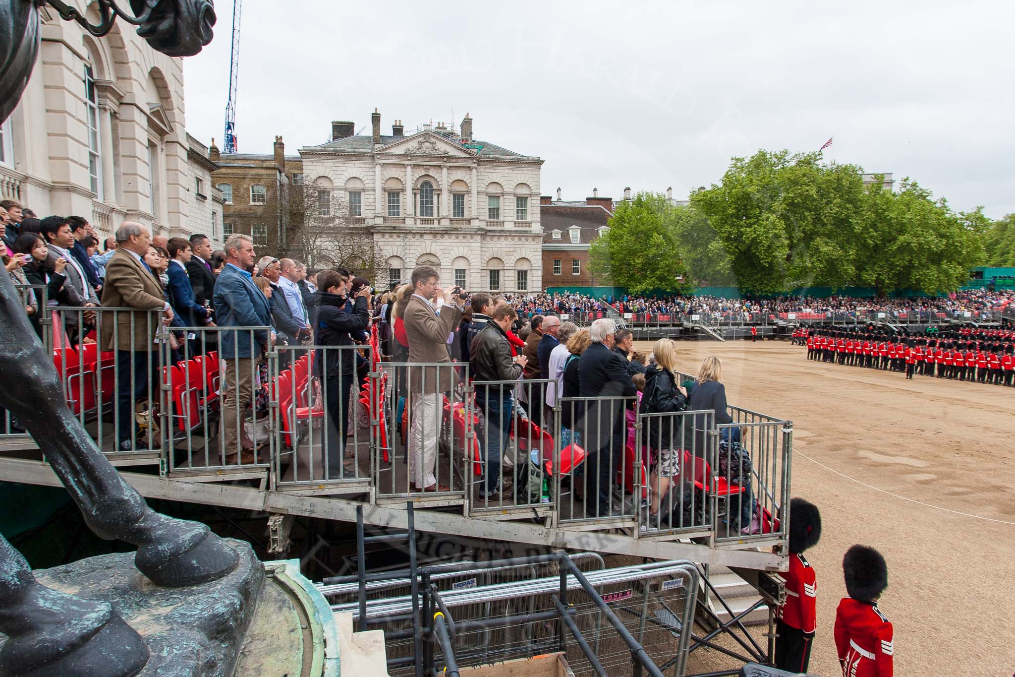 Major General's Review 2013: Wide angle view from the press stand, including spectators and photographers,  during the March Past..
Horse Guards Parade, Westminster,
London SW1,

United Kingdom,
on 01 June 2013 at 11:32, image #479
