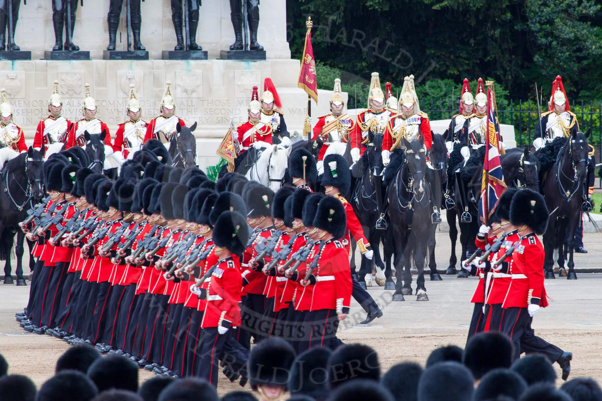 Major General's Review 2013: No. 1 Guard (Escort for the Colour),1st Battalion Welsh Guards, at the beginning of the March Past in Quick Time. Behind them The Blues and Royals and Life Guards of the Household Cavalry. The Field Officer returns to the head of the march past..
Horse Guards Parade, Westminster,
London SW1,

United Kingdom,
on 01 June 2013 at 11:40, image #525