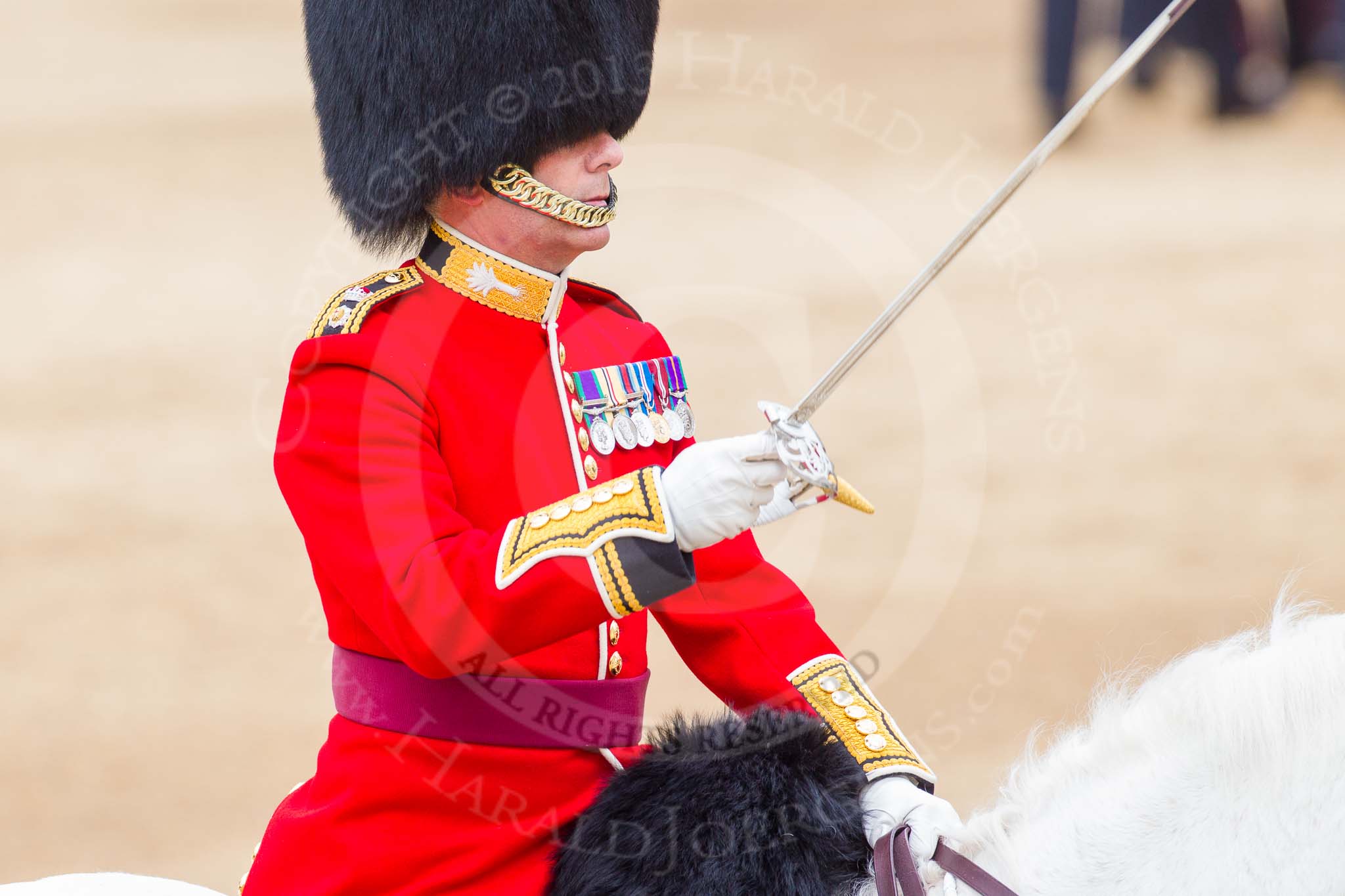 Major General's Review 2013: The Field Officer in Brigade Waiting, Lieutenant Colonel Dino Bossi, Welsh Guards, saluting  during the March Past in Quick Time..
Horse Guards Parade, Westminster,
London SW1,

United Kingdom,
on 01 June 2013 at 11:45, image #552