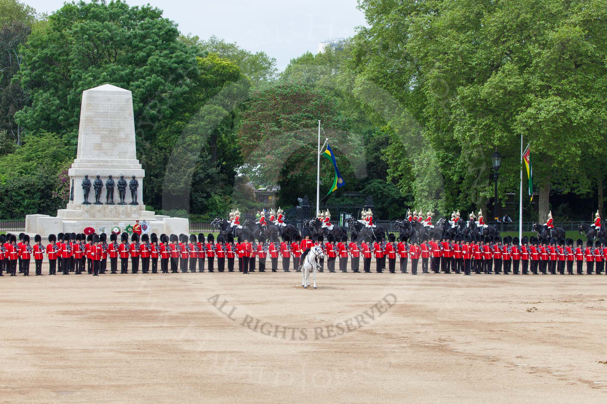Major General's Review 2013: A wide angle overview of Horse Guards Parade after the Ride Past. The Household Cavalry is returning to their initial positions below the flags, next to St James's Park..
Horse Guards Parade, Westminster,
London SW1,

United Kingdom,
on 01 June 2013 at 11:58, image #666