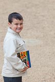 Major General's Review 2013: A young male spectator arriving at Horse Guards Parade for the Major General's Review, proudly carrying the official programme..
Horse Guards Parade, Westminster,
London SW1,

United Kingdom,
on 01 June 2013 at 09:31, image #9