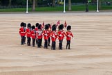 Major General's Review 2013: The 'Keepers of the Ground', guardsmen bearing marker flags for their respective regiments, turning towards Horse Guards Parade at the Guards Memorial..
Horse Guards Parade, Westminster,
London SW1,

United Kingdom,
on 01 June 2013 at 09:54, image #19
