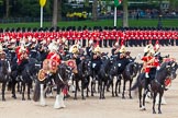 Major General's Review 2013: The Director of Music of the Household Cavalry, Major Paul Wilman, The Life Guards, during the Mounted Troops Ride Past. Behind him the kettle drummer from The Blues and Royals..
Horse Guards Parade, Westminster,
London SW1,

United Kingdom,
on 01 June 2013 at 11:51, image #587