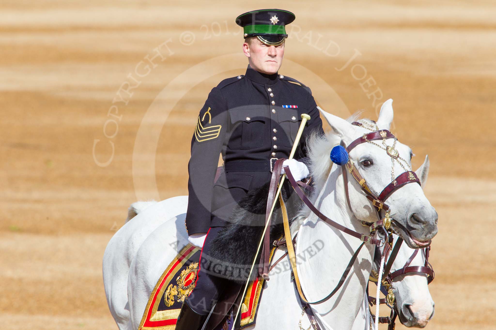Trooping the Colour 2013: Two of the officer's horse for the parade are led to Horse Guards Parade by an Army riding instructor. Image #10, 15 June 2013 08:48 Horse Guards Parade, London, UK