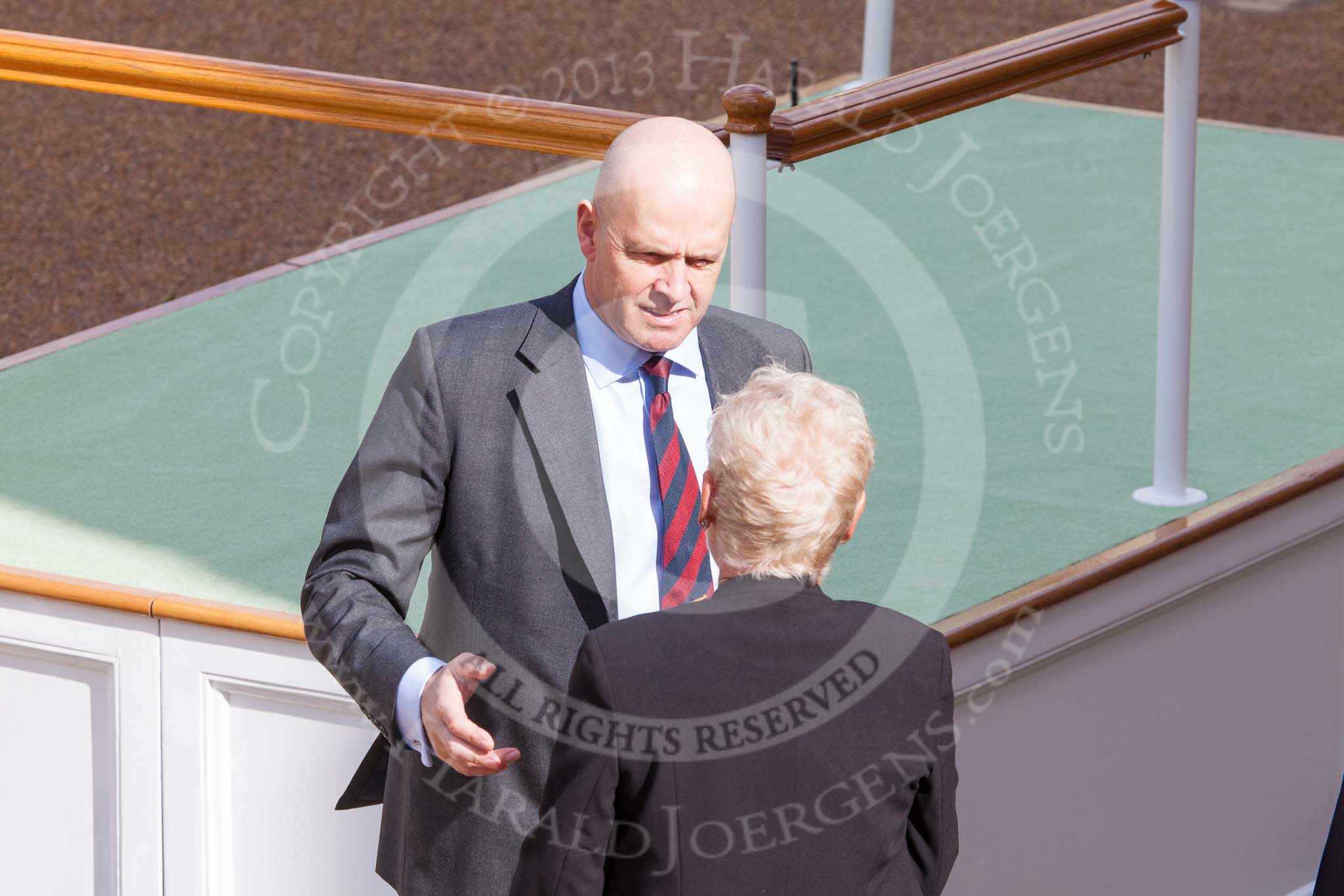Trooping the Colour 2013: Allegedly the most feared man in the British Army, WO1 Garrison Sergeant Major William 'Bill' Mott OBE MVO, Welsh Guards, in charge of ceremonial events in London District, chatting with a spectator. Image #19, 15 June 2013 09:03 Horse Guards Parade, London, UK