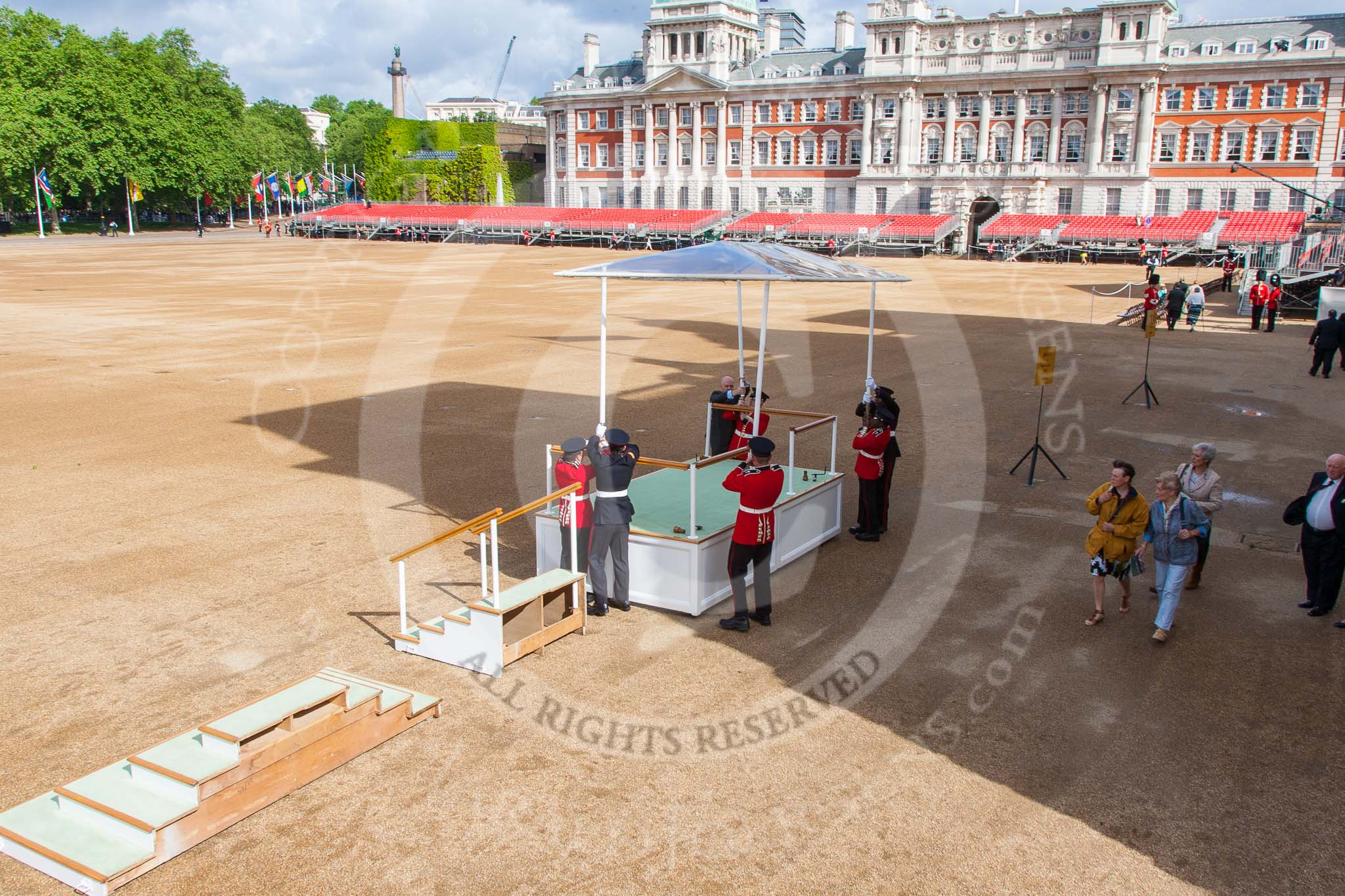Trooping the Colour 2013: A glass roof is mounted on top of the saluting base for HM The Queen - showers are expected throughout this breezy day. Image #21, 15 June 2013 09:05 Horse Guards Parade, London, UK