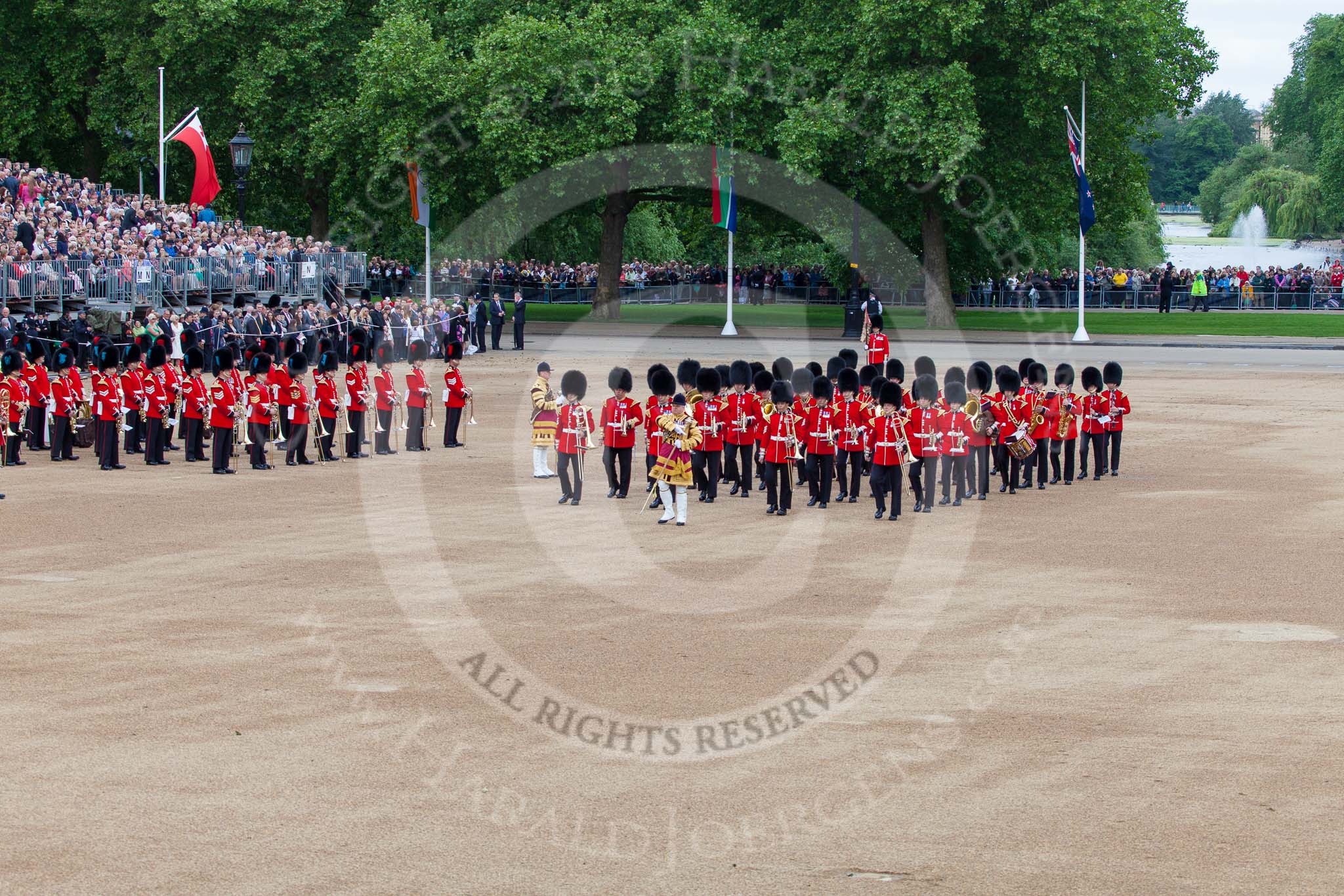 Trooping the Colour 2013: The Band of the Scots Guards arrives at Horse Guards Parade. Already present are the Band of the Coldstream Guards (red plumes) and the Band of the Irish Guards (blue plumes). Image #81, 15 June 2013 10:24 Horse Guards Parade, London, UK