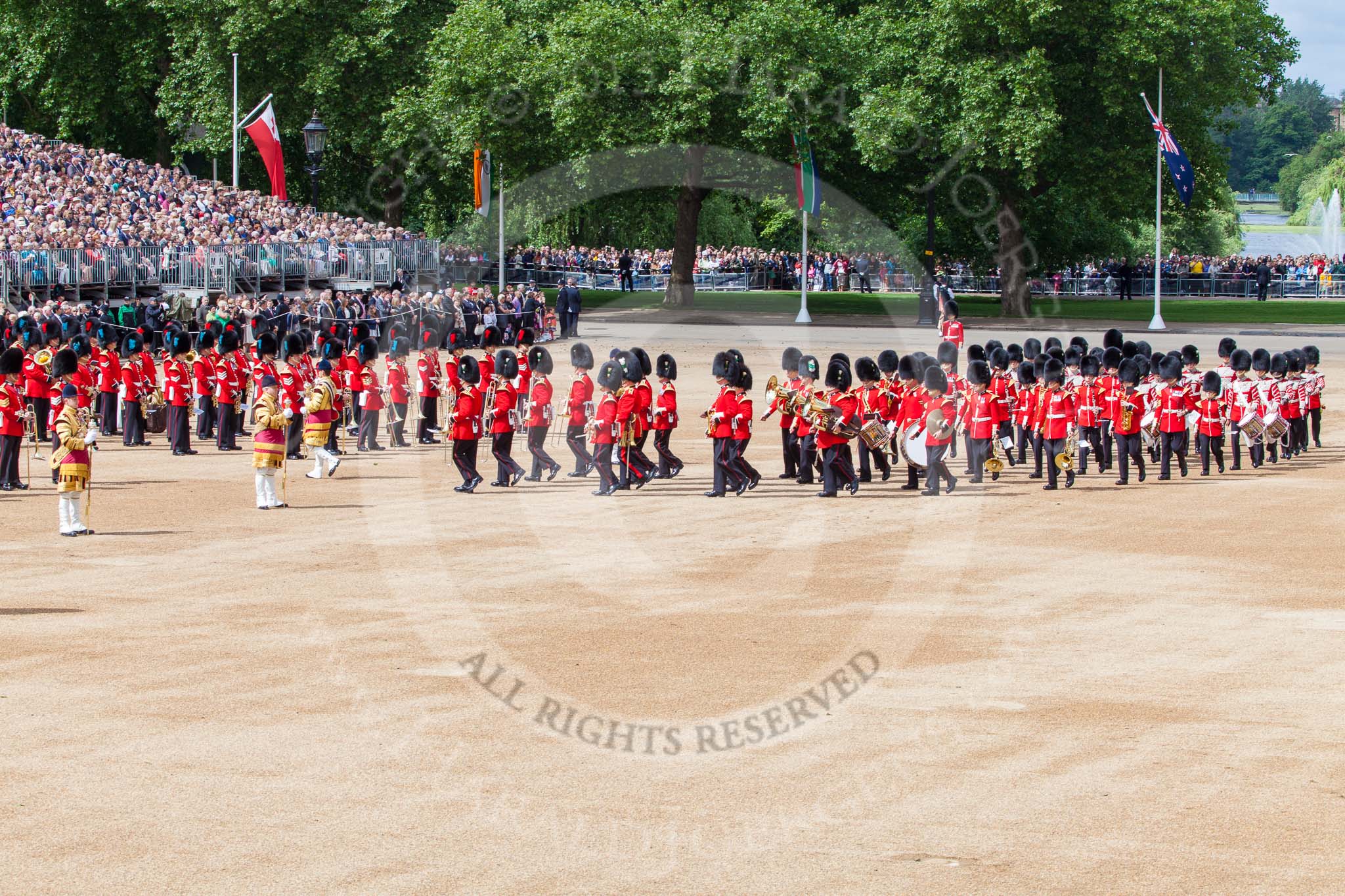 Trooping the Colour 2013: The Band of the Welsh Guards, led by Drum Major Neill Lawman, marches into position next to the other bands. Image #115, 15 June 2013 10:32 Horse Guards Parade, London, UK