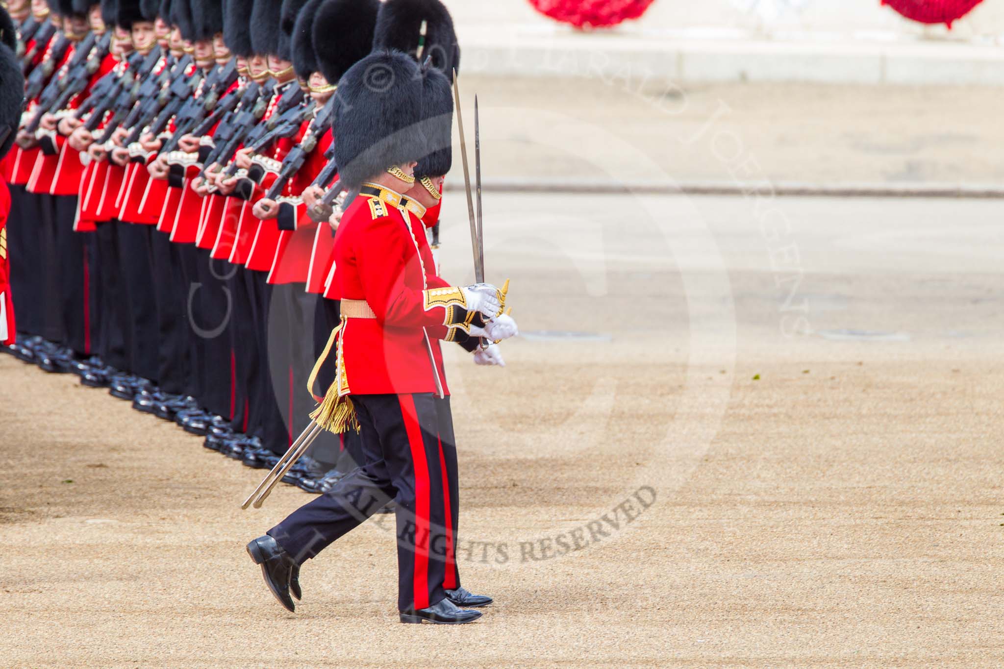 Trooping the Colour 2013: The Subaltern of No. 1 Guard, Captain F O Lloyd-George, and the Subaltern of No. 2 Guard, Captain B Bardsley, are marching together to Horse Guards Arch. They will return later, with the other 16 officers, three for each guard. Image #119, 15 June 2013 10:33 Horse Guards Parade, London, UK