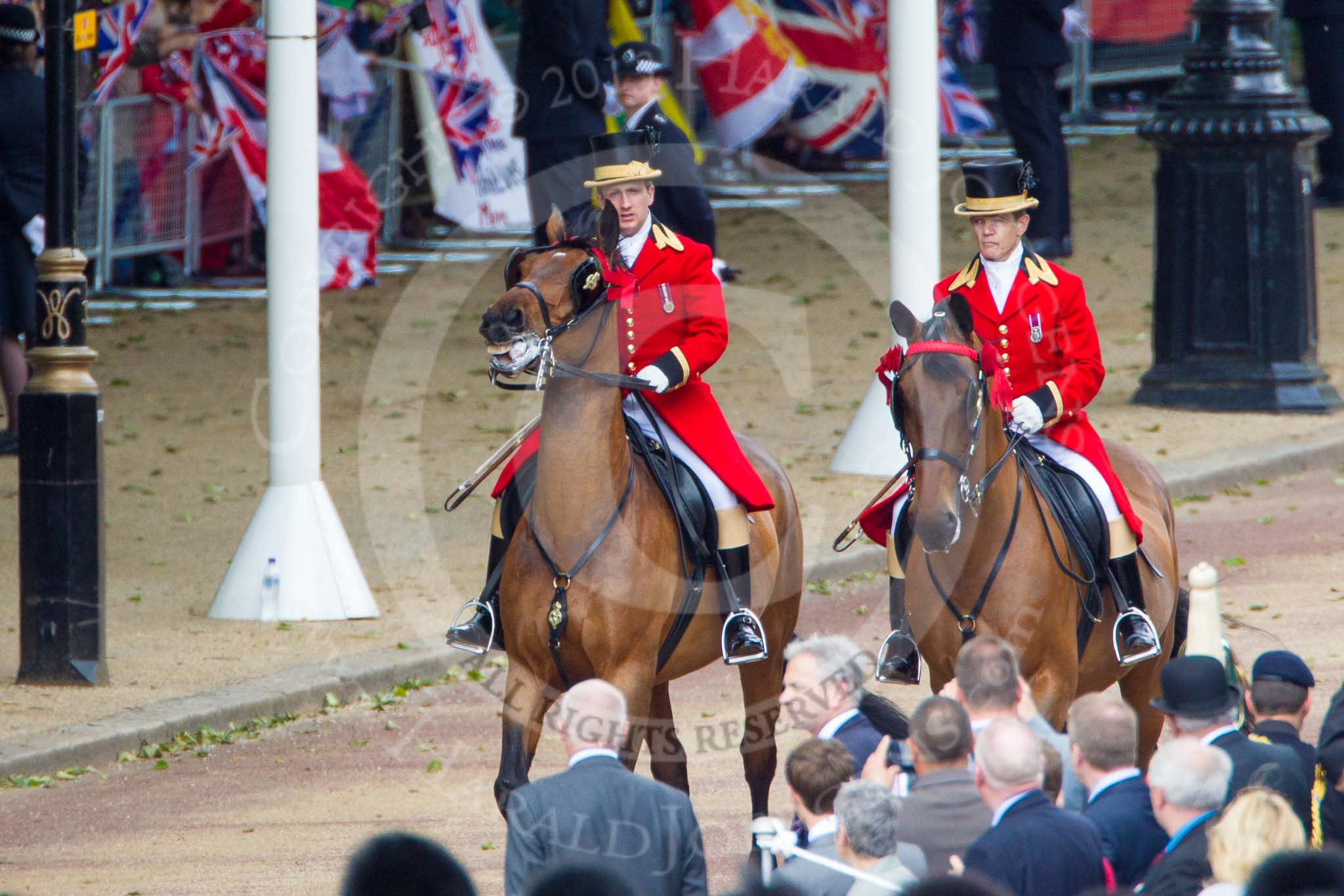 Trooping the Colour 2013: Two grooms are leading the line of coaches carrying members of the Royal Family across Horse Guards Parade. Image #180, 15 June 2013 10:48 Horse Guards Parade, London, UK