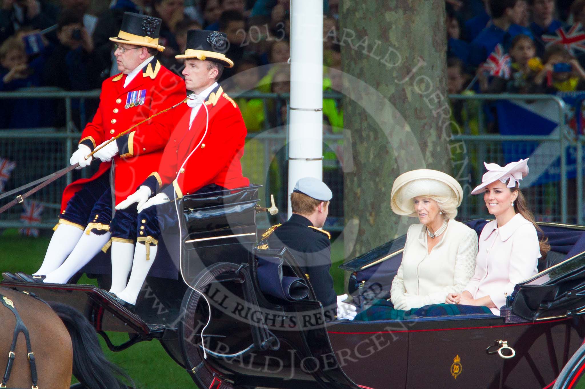 Trooping the Colour 2013: HRH Prince Harry of Wales, HRH The Duchess of Cornwall  and HRH The Duchess of Cambridge in the first barouche carriage on the way across Horse Guards Parade to watch the parade from the Major General's office. Image #184, 15 June 2013 10:49 Horse Guards Parade, London, UK