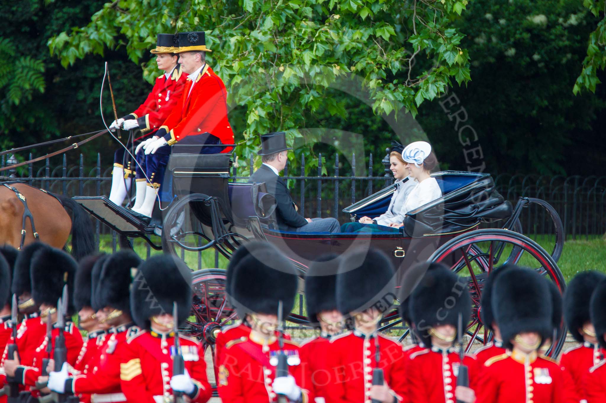 Trooping the Colour 2013: HRH The Duke of York  and his daughters, HRH Princess Beatrice of York and HRH Princess Eugenie of York in the second barouche carriage on the way across Horse Guards Parade to watch the parade from the Major General's office. Image #190, 15 June 2013 10:49 Horse Guards Parade, London, UK