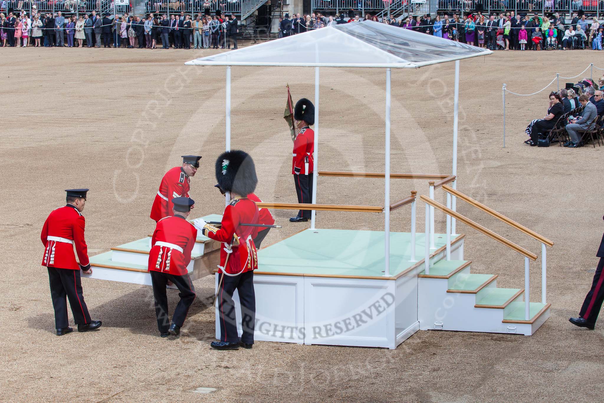 Trooping the Colour 2013: The dais, the saluting platform for HM The Queen, is in the final stages of assembly, shortly before the arrival of the Royal Procession. Image #224, 15 June 2013 10:54 Horse Guards Parade, London, UK