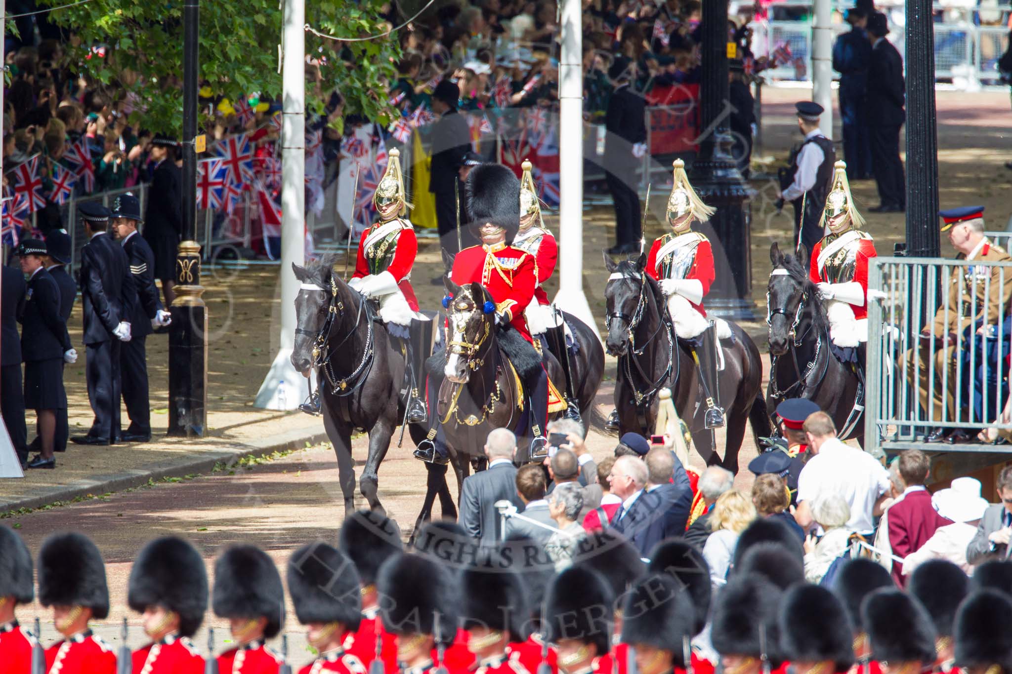 Trooping the Colour 2013: Leading the Royal Procession from The Mall onto Horse Guards Parade - Brigade Major Household Division Lieutenant Colonel Simon Soskin, Grenadier Guards, followed by four Troopers of The Life Guards. Image #227, 15 June 2013 10:55 Horse Guards Parade, London, UK