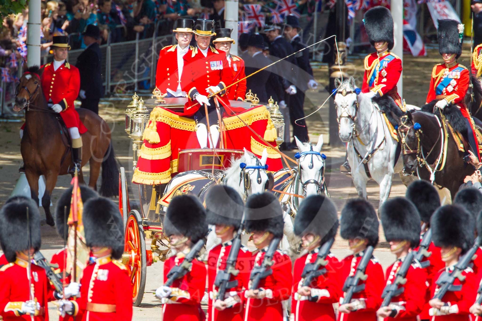 Trooping the Colour 2013: The Glass Coach carrying HM The Queen arrives at Horse Guards Parade, drawn by two Windsor Grey horses. On the very right HRH The Duke of Cambridge and HRH The Prince of Wales. Image #252, 15 June 2013 10:58 Horse Guards Parade, London, UK