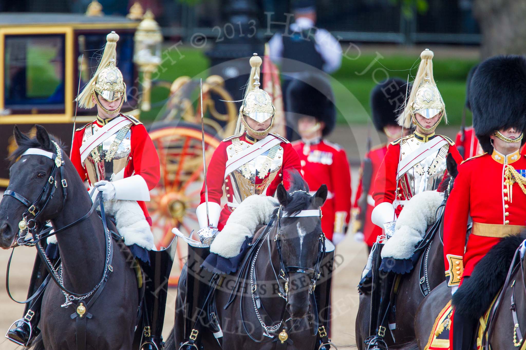 Trooping the Colour 2013: The Brigade Major Household Division Lieutenant Colonel Simon Soskin, Grenadier Guards, followed by the four Troopers of The Life Guard, after the Inspection of the Line. Image #352, 15 June 2013 11:06 Horse Guards Parade, London, UK