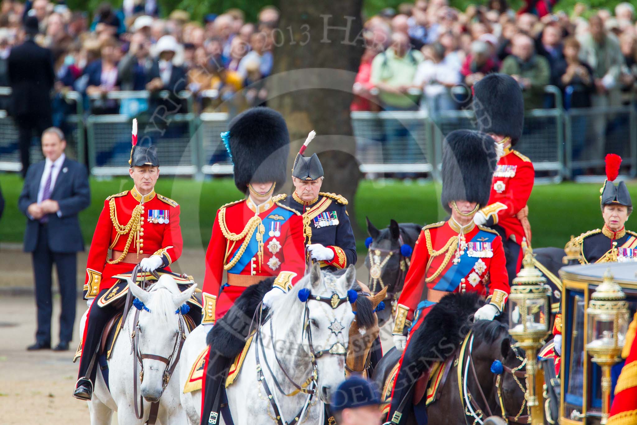 Trooping the Colour 2013: The Equerry in Waiting to Her Majesty, Lieutenant Colonel Alexander Matheson of Matheson, younger, and Crown Equerry Colonel Toby Browne in focus behind the Royal Colonels..
Horse Guards Parade, Westminster,
London SW1,

United Kingdom,
on 15 June 2013 at 11:06, image #364