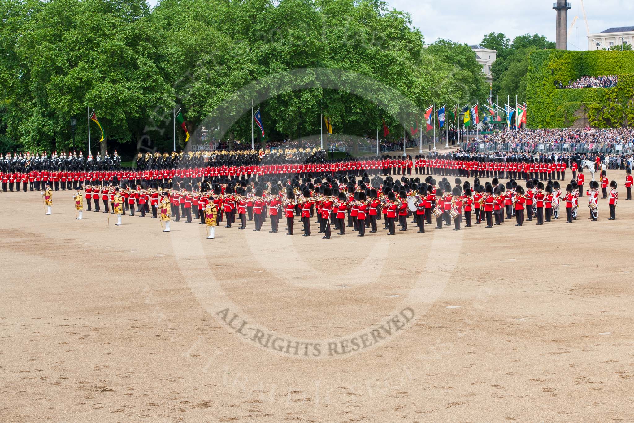 Trooping the Colour 2013: The Massed Band Troop - the countermarch in quick time is Heroes' Return. Behind the massed bands is No. 6 Guard, and next to them the Adjutant of the Parade and the Colour Party. Image #409, 15 June 2013 11:12 Horse Guards Parade, London, UK