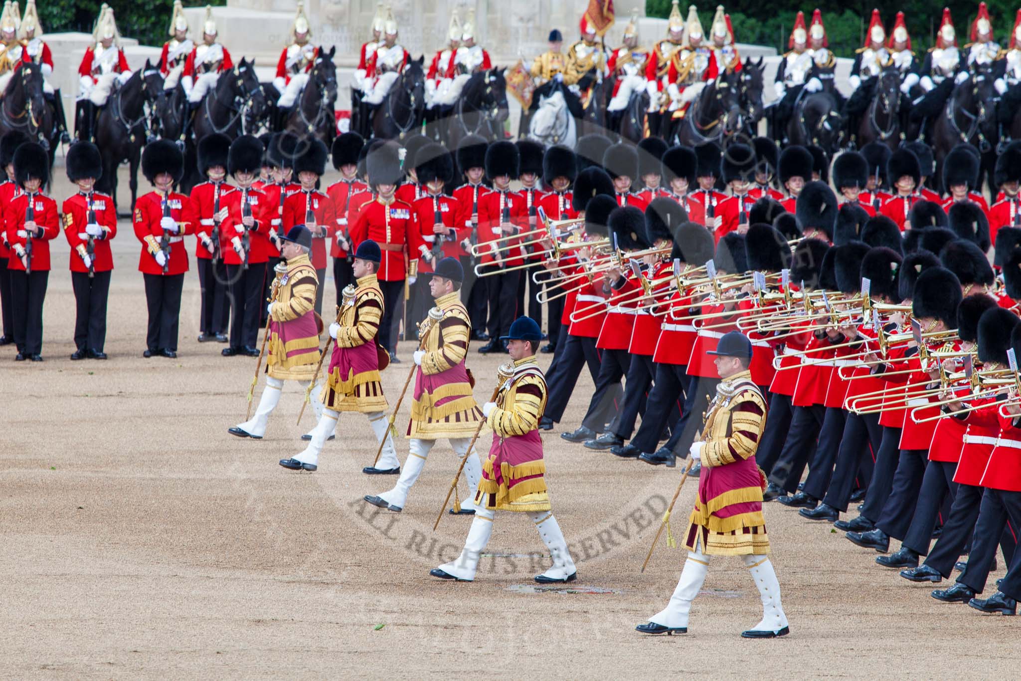 Trooping the Colour 2013: The five Drum Majors leading the Massed Bands as they are playing the Grenadiers Slow March. Image #489, 15 June 2013 11:25 Horse Guards Parade, London, UK