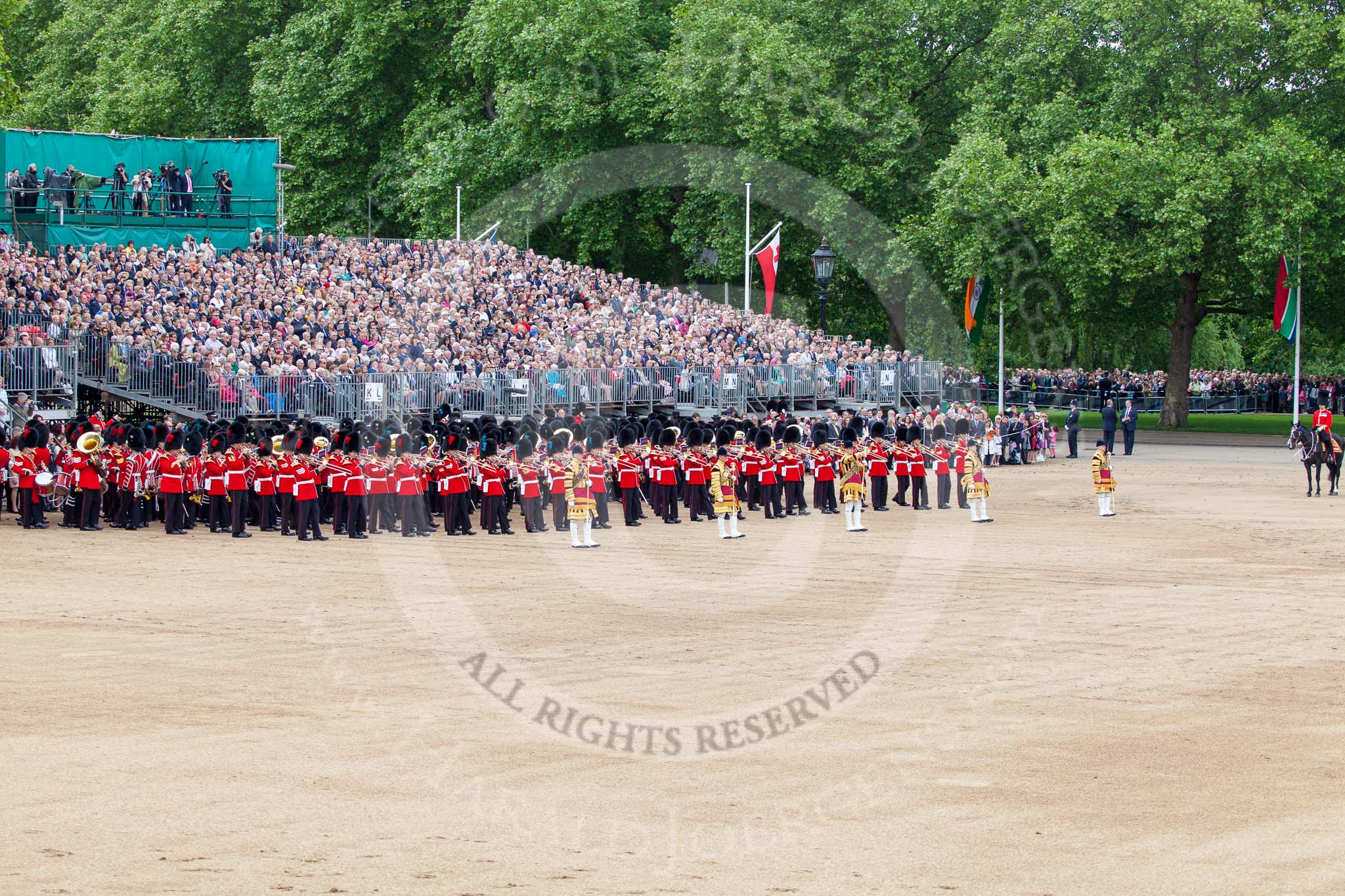 Trooping the Colour 2013: The western side of Horse Guards Parade, with the Massed Bands close to the spectators, and the Major of the Parade on the very right of the image. Image #497, 15 June 2013 11:26 Horse Guards Parade, London, UK