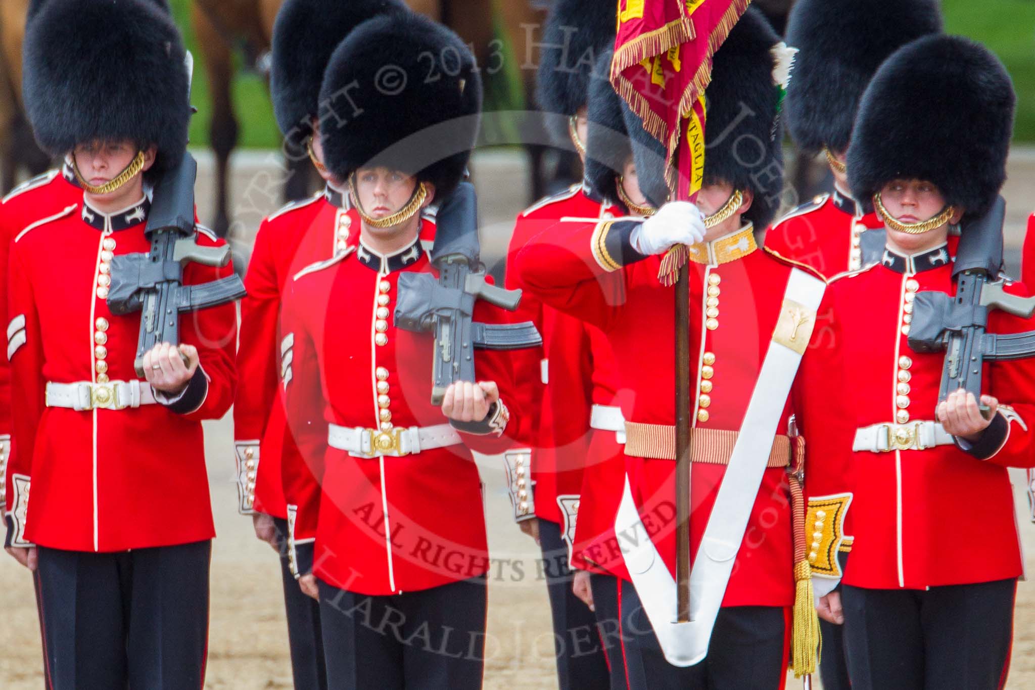 Trooping the Colour 2013: The Ensign, Second Lieutenant Joel Dinwiddle, and the Escort to the Colour,are back at their initial position, when they were the Escort for the Colour. Image #510, 15 June 2013 11:28 Horse Guards Parade, London, UK