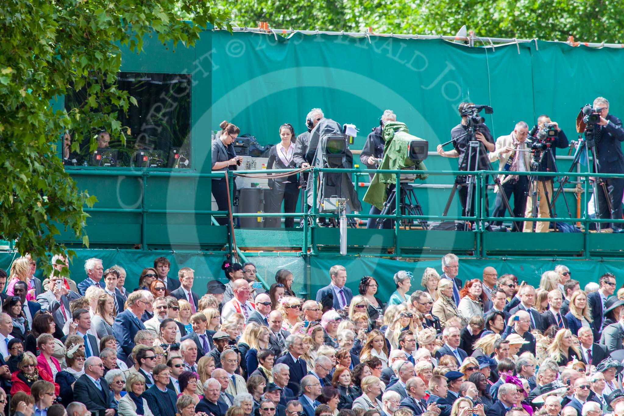 Trooping the Colour 2013: Huw Edwars and his team in the box on the left, and television crews on the press stand on the western side of Horse Guards Parade. Image #531, 15 June 2013 11:33 Horse Guards Parade, London, UK