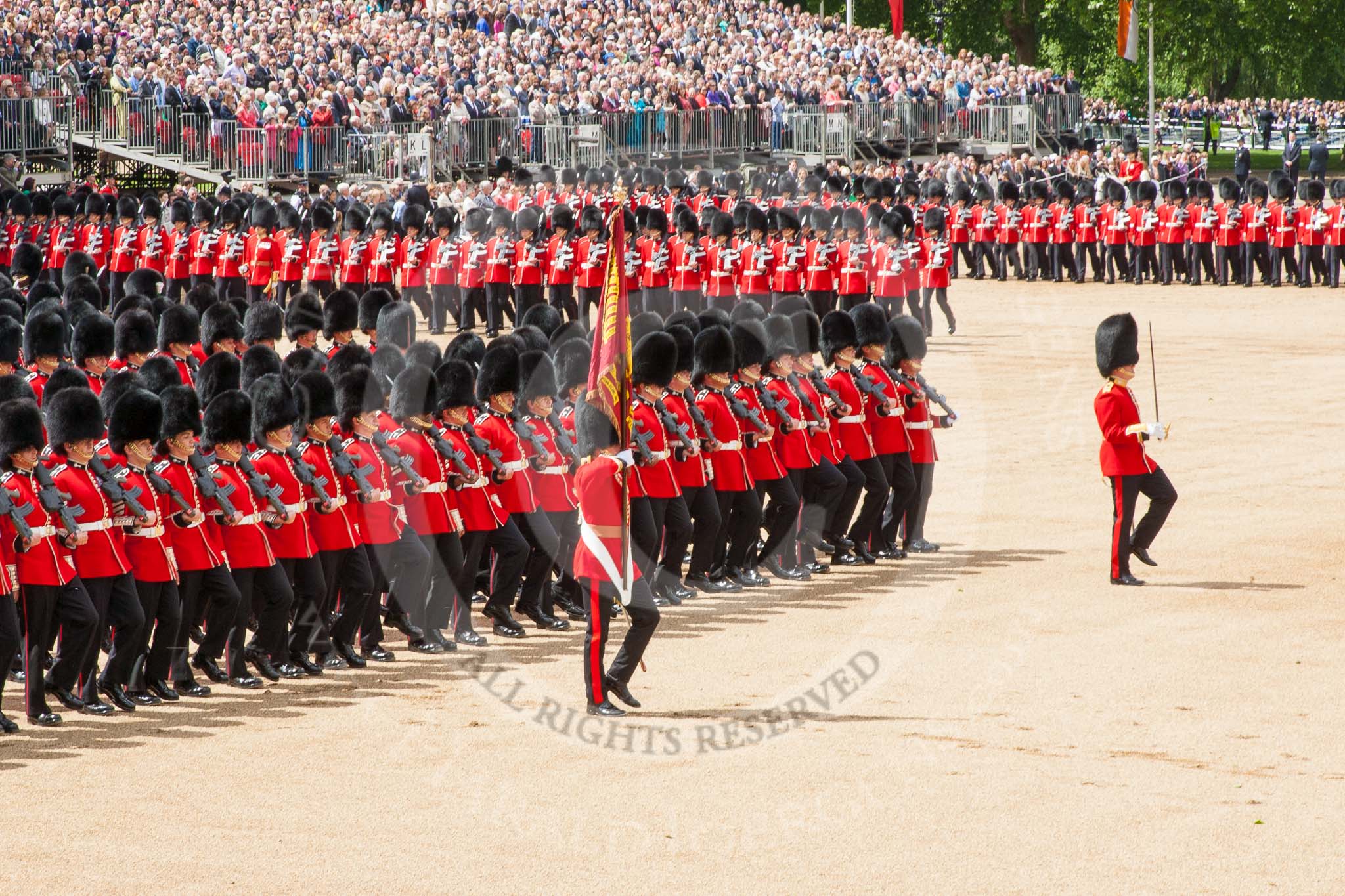 Trooping the Colour 2013: The March Past in Slow Time - the Ensign, Second Lieutenant Joel Dinwiddle, in front of No. 1 Guard, the Escort to the Colour. Image #537, 15 June 2013 11:35 Horse Guards Parade, London, UK