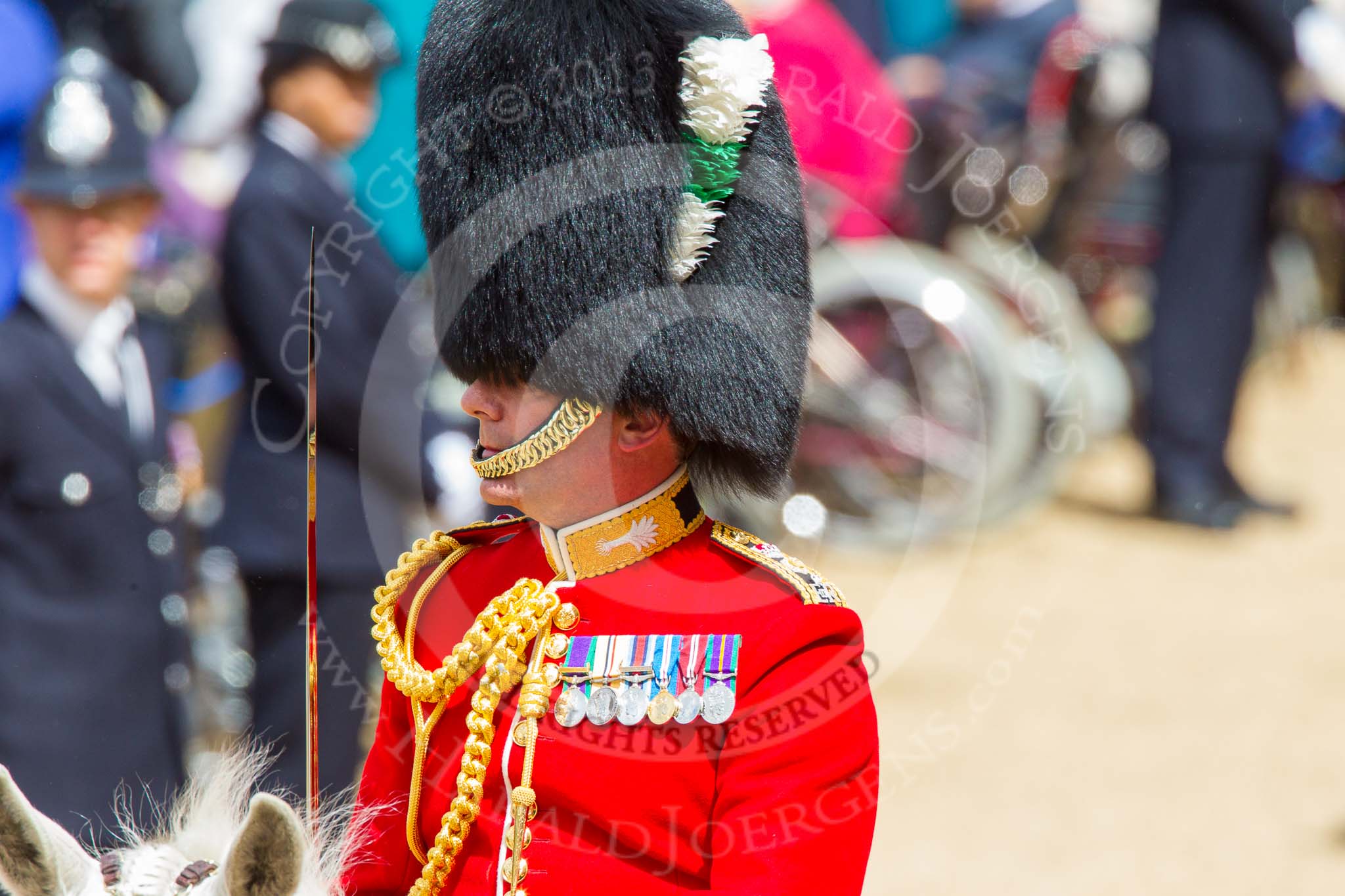 Trooping the Colour 2013: A close-up of the Field Officer in Brigade Waiting, Lieutenant Colonel Dino Bossi, Welsh Guards, with his word drawn, during the March Past. Image #543, 15 June 2013 11:37 Horse Guards Parade, London, UK