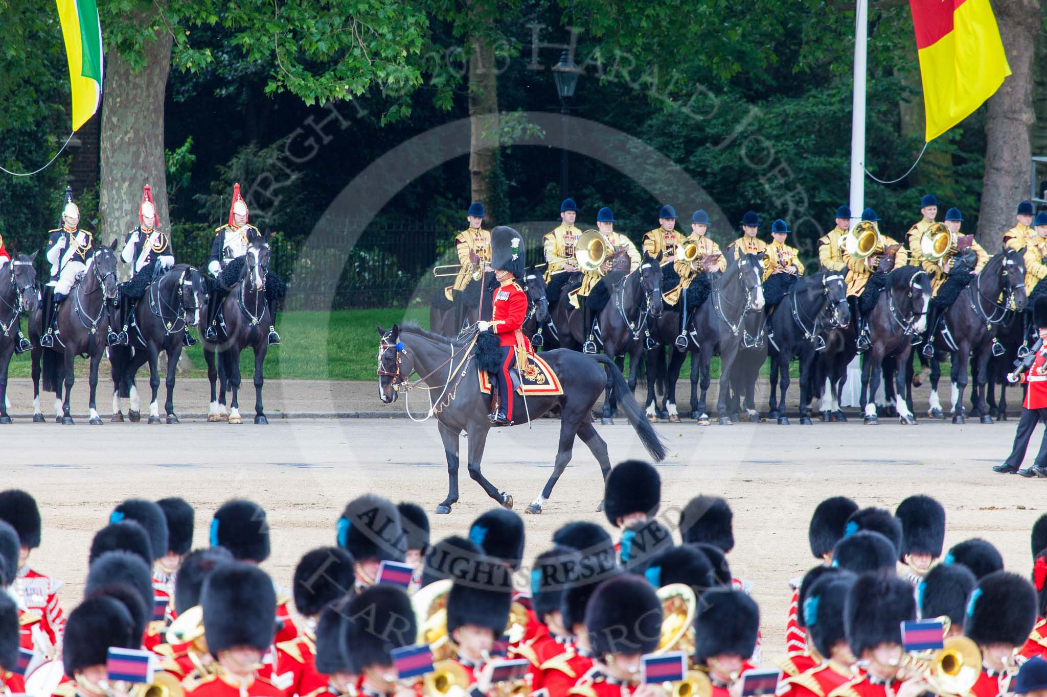 Trooping the Colour 2013: The Major of the Parade, Major H G C Bettinson, Welsh Guards, leading the guards as they change pace from slow march to quick march. Image #574, 15 June 2013 11:42 Horse Guards Parade, London, UK