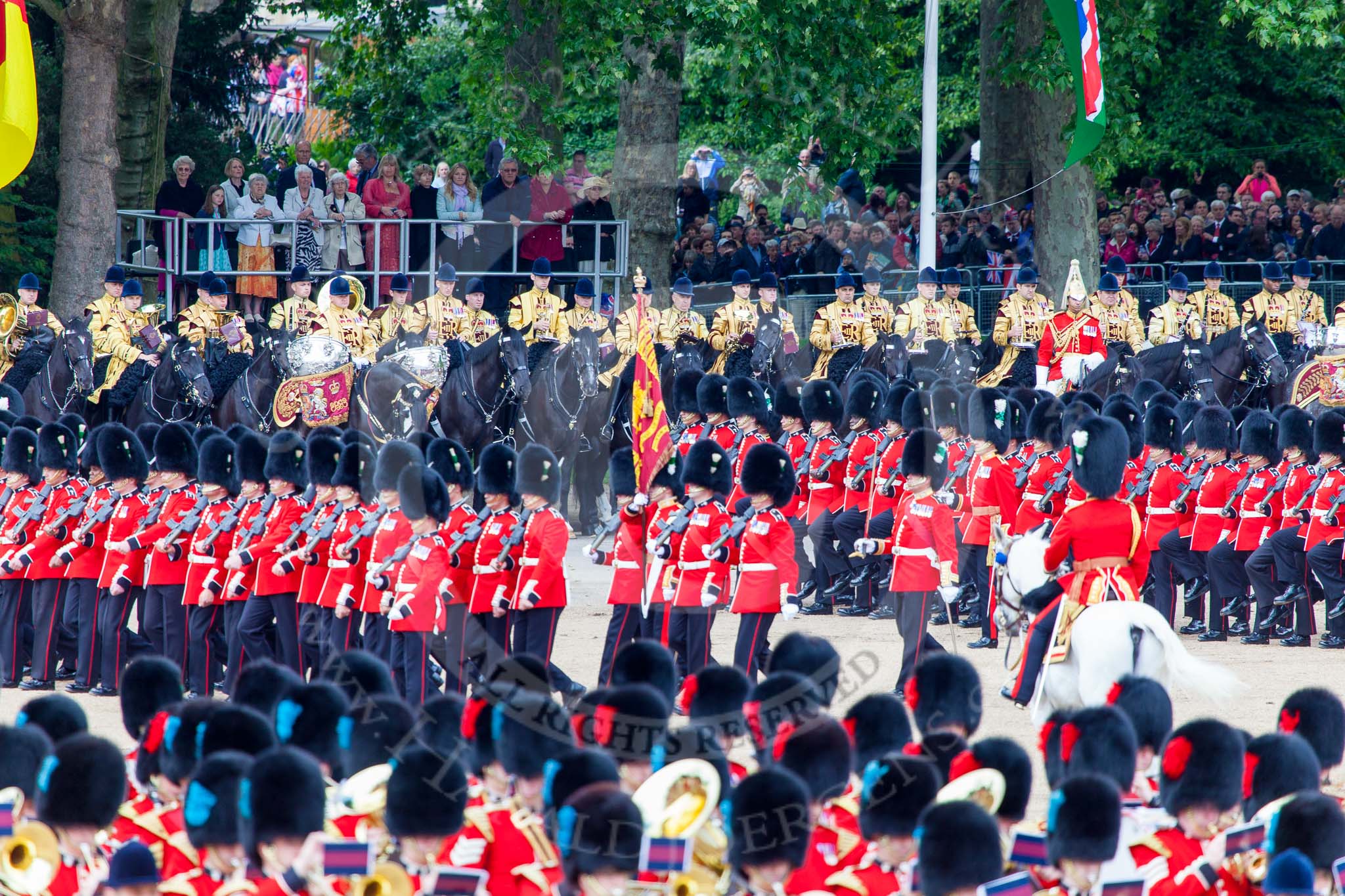 Trooping the Colour 2013: No. 1 Guard (Escort for the Colour),1st Battalion Welsh Guards, at the beginning of the March Past in Quick Time. Behind them the Mounted Bands of the Household Cavalry. Image #576, 15 June 2013 11:42 Horse Guards Parade, London, UK