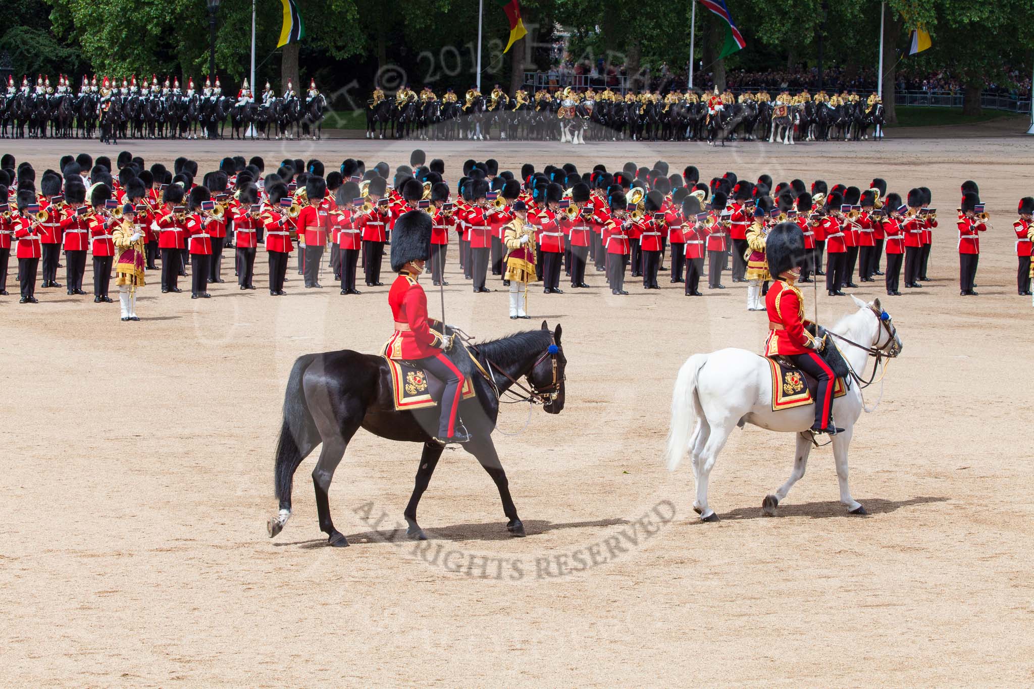 Trooping the Colour 2013: The March Past in Quick Time - the Major of the Parade, Major H G C Bettinson, Welsh Guards, and the Field Officer in Brigade Waiting, Lieutenant Colonel Dino Bossi, Welsh Guards. Image #601, 15 June 2013 11:45 Horse Guards Parade, London, UK