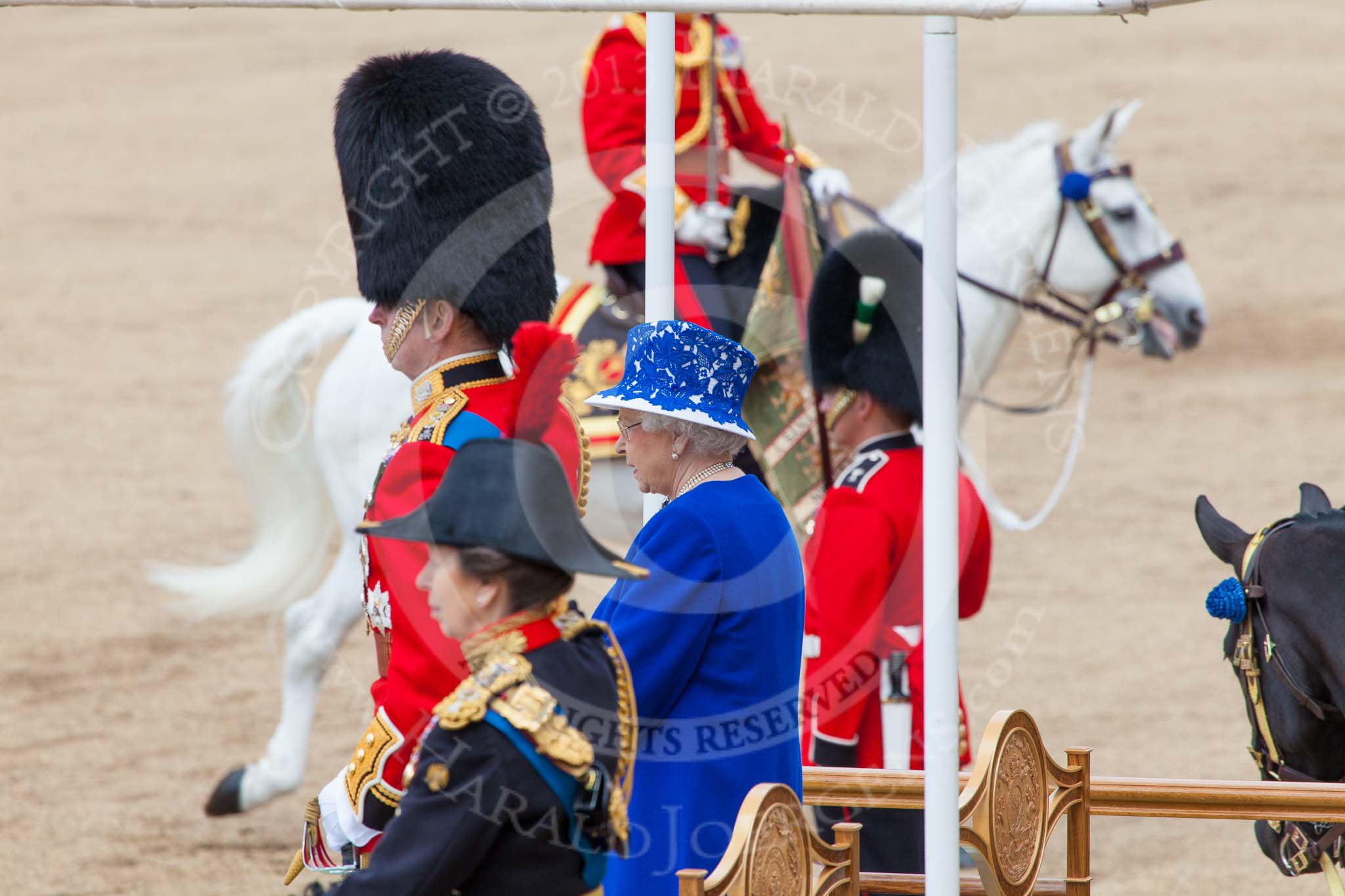 Trooping the Colour 2013: HRH The Duke of Kent and HM The Queen are standing on the dais during the March Past. Image #604, 15 June 2013 11:45 Horse Guards Parade, London, UK