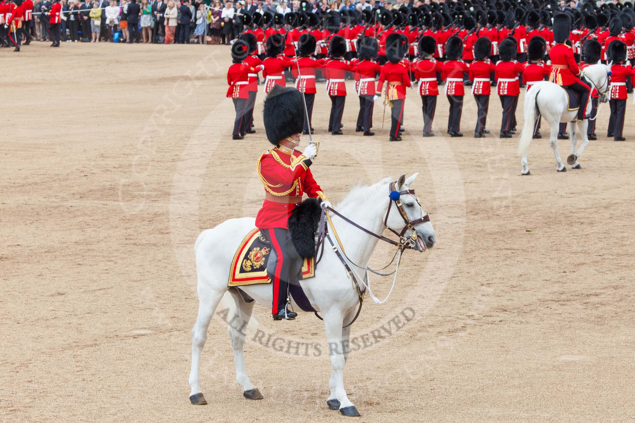 Trooping the Colour 2013: The Field Officer in Brigade Waiting, Lieutenant Colonel Dino Bossi, Welsh Guards, saluting Her Majesty during the March Past in Quick Time. Image #612, 15 June 2013 11:47 Horse Guards Parade, London, UK