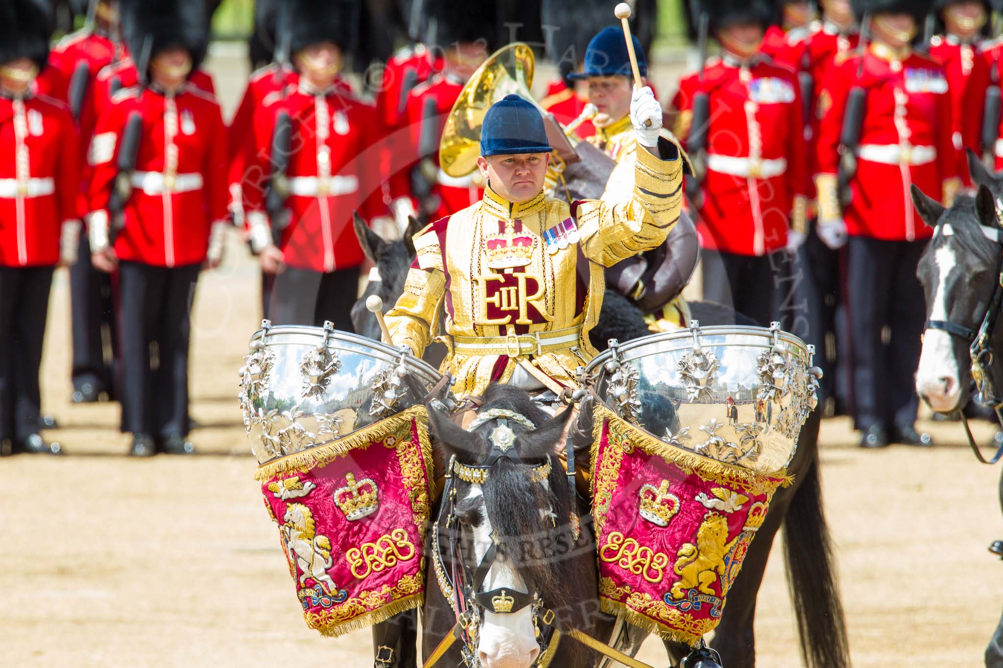 Trooping the Colour 2013: The Ride Past - the Mounted Bands of the Household Cavalry move, from the eastern side, onto Horse Guards Parade. Here the kettle drummer from The Life Guards. Image #655, 15 June 2013 11:53 Horse Guards Parade, London, UK