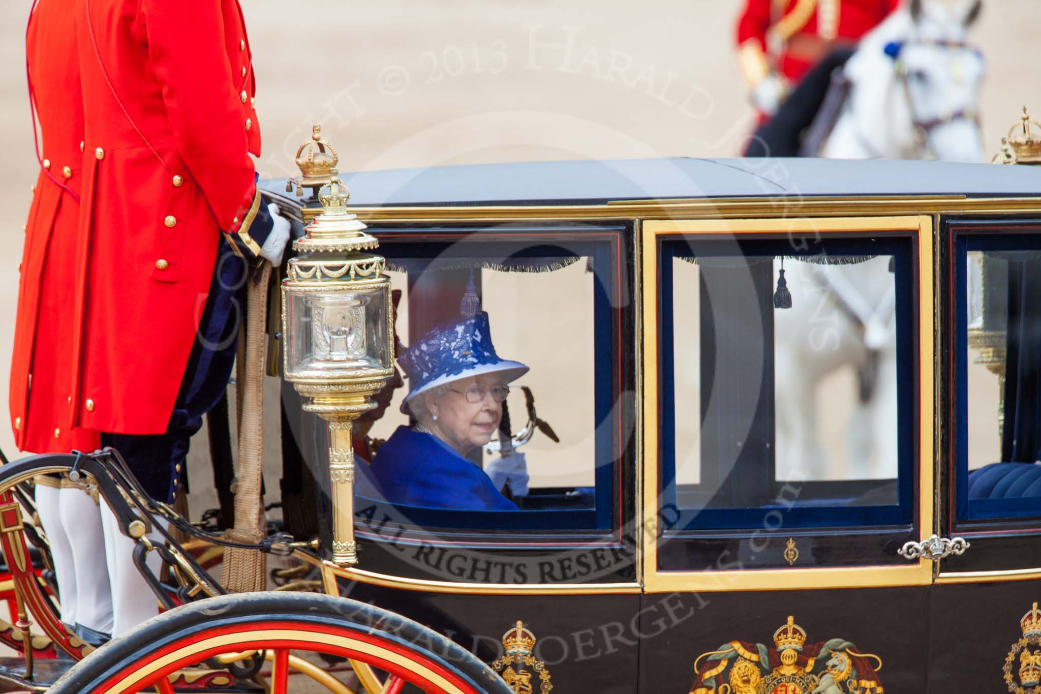Trooping the Colour 2013: HM The Queen in the glass coach, leaving Horse Guards Parade. Image #821, 15 June 2013 12:11 Horse Guards Parade, London, UK