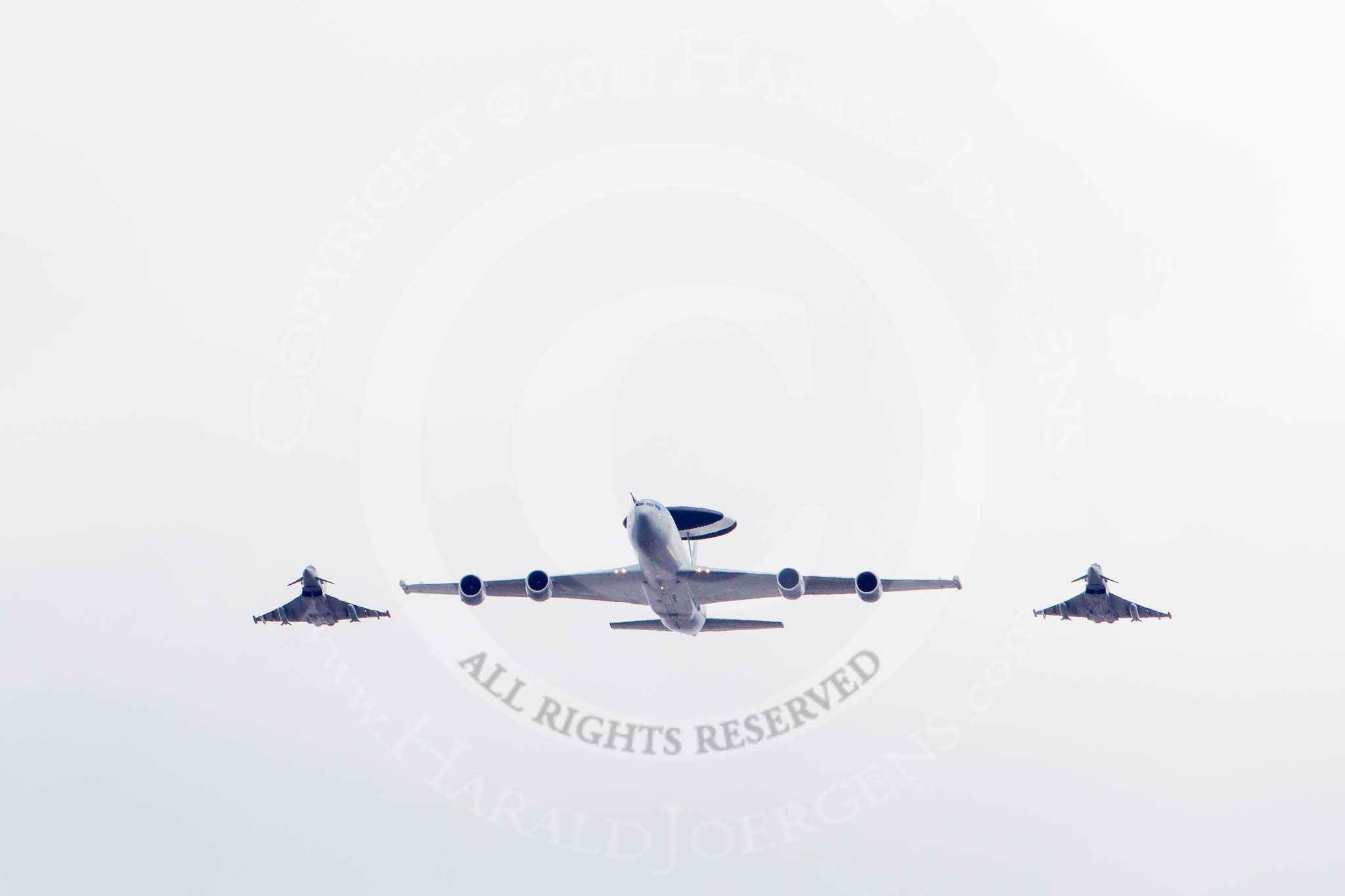 Trooping the Colour 2013: The RAF Flypast - the E-3D Sentry, with the big radar dome, and two Typhoon jets. Image #898, 15 June 2013 13:00 Horse Guards Parade, London, UK