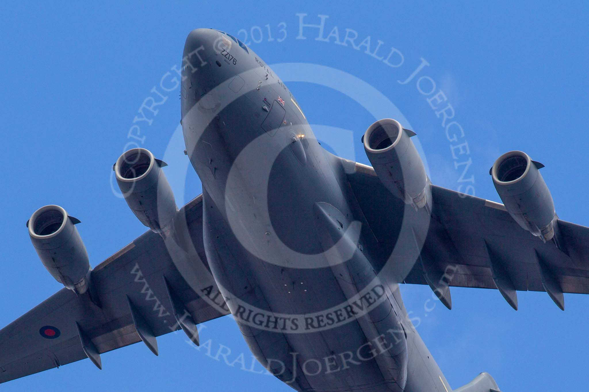 Trooping the Colour 2013: The RAF Flypast - the enormous C-17 Globemaster (ZZ176), with two HS-125 from RAF Northolt. Image #908, 15 June 2013 13:01 Horse Guards Parade, London, UK