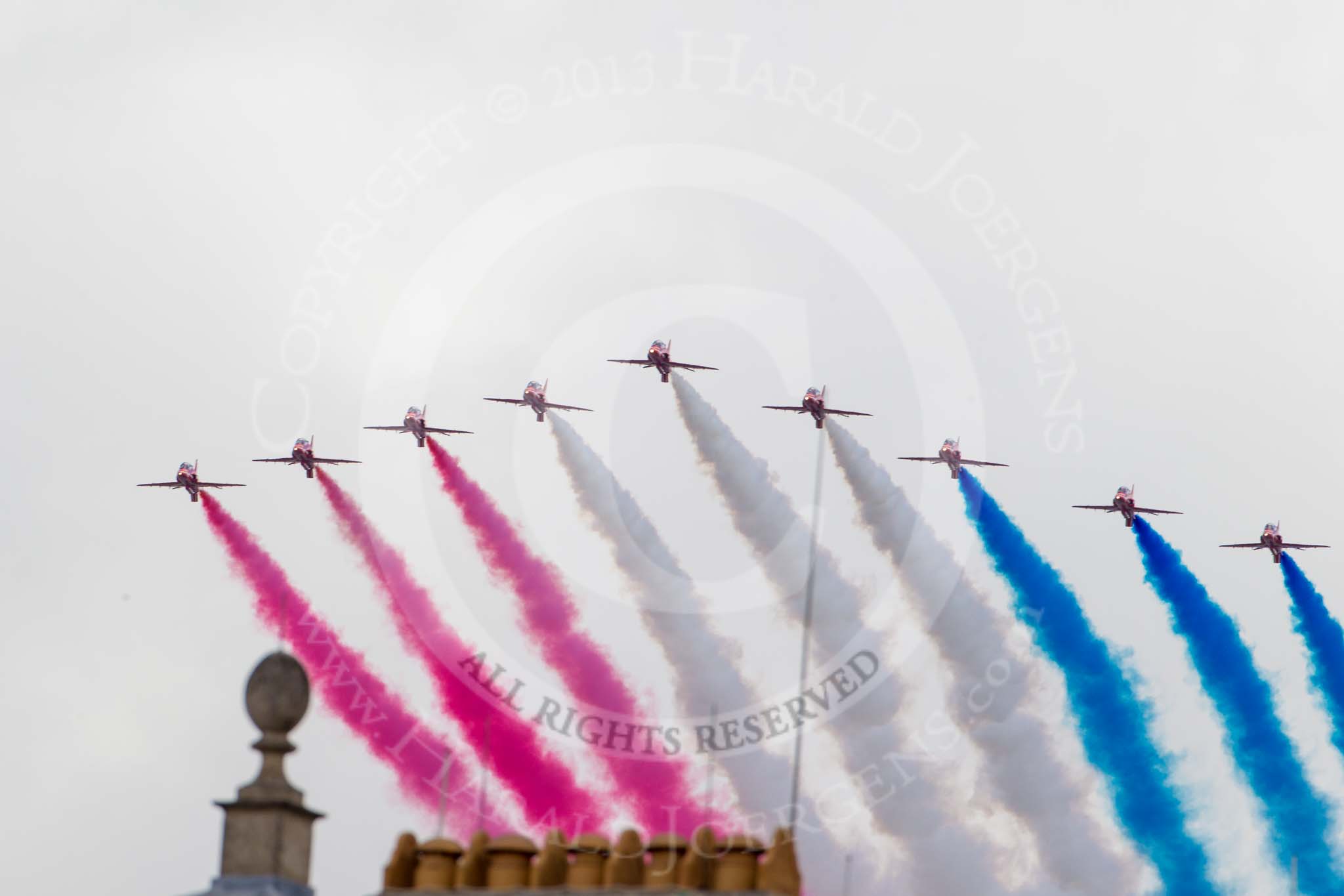 Trooping the Colour 2013: The RAF Flypast - the Red Arrows, red, white and blue smoke!. Image #925, 15 June 2013 13:03 Horse Guards Parade, London, UK
