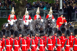 Trooping the Colour 2013: Brigade Major Household Division Lieutenant Colonel Simon Soskin, Grenadier Guards, followed by four Troopers of The Life Guards, leading the Royal Procession onto Horse Guards Parade. Image #231, 15 June 2013 10:56 Horse Guards Parade, London, UK