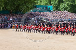 Trooping the Colour 2013: The Massed Band Troop - the countermarch is about to end. In the top right of the image one of the press stands used by the BBC for their live broadcast, with Huw Edwards and his team in the green box next to the press stand. Image #419, 15 June 2013 11:14 Horse Guards Parade, London, UK