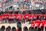 Trooping the Colour 2013: No. 1 Guard, the Escort to the Colour),1st Battalion Welsh Guards, with the Ensign carrting the Colour behind the lines of guardsmen, during the March Past. Image #558, 15 June 2013 11:39 Horse Guards Parade, London, UK