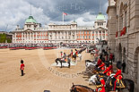 Trooping the Colour 2013: A very wide angle overview of Horse Guards Parade during the March Past in Slow Time. On the very right, decorated in red, the windows of the Major General's Office, from where members of the Royal Faily are watching the parade. Image #570, 15 June 2013 11:41 Horse Guards Parade, London, UK