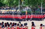 Trooping the Colour 2013: The March Past in Quick Time. No. 1 Guard, the Escort to the Colour,1st Battalion Welsh Guards,  marching along the Mounted Bands of the Household Cavalry. Image #617, 15 June 2013 11:48 Horse Guards Parade, London, UK
