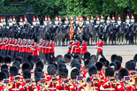 Trooping the Colour 2013: The March Past in Quick Time. The guards are marching beween the Massed Bands, in front, and the Blues and Royals behind them. The Colour Party and the Regimental Sergeant Major ar marching behind No.  Guard. Image #622, 15 June 2013 11:48 Horse Guards Parade, London, UK