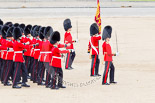 Trooping the Colour 2013: No. 1 Guard (Escort for the Colour),1st Battalion Welsh Guards, during the March Off. Ensign, Second Lieutenant Joel Dinwiddle, carrying the Colour. On his right Major E N Launders, on his left Captain F O Lloyd-George. Image #832, 15 June 2013 12:11 Horse Guards Parade, London, UK