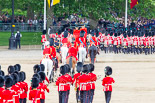 Trooping the Colour 2013: The March Off - the Massed Bands are leaving towards The Mall, followed by the glass coach carrying HM The Queen and HRH The Duke of Kent. Behind members of the Royal Procession, followed by No. 1 Guard. Image #844, 15 June 2013 12:12 Horse Guards Parade, London, UK