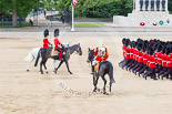 Trooping the Colour 2013: Following No. 6 Guard, No. 7 Company Coldstream Guards, during the March Off are the Adjutant of the Parade, Captain C J P Davies, Welsh Guards, on the white horse, and the Major of the Parade, Major H G C Bettinson, Welsh Guards, on the dark horse. Riding towards them is the Gold Stick in Waiting and Colonel Life Guards, Field Marshal the Lord Guthrie of Craigiebank. Image #849, 15 June 2013 12:12 Horse Guards Parade, London, UK